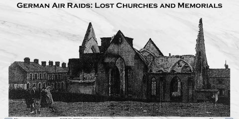 Black and white photograph of a damaged church and a small group of people in the foreground