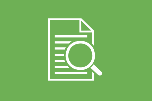 Icon in white of a document with a magnifying glass on the right hand side, over a green backdrop.