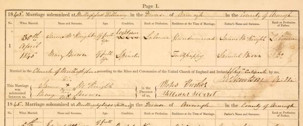 Small document on yellowed paper with tables and writing.