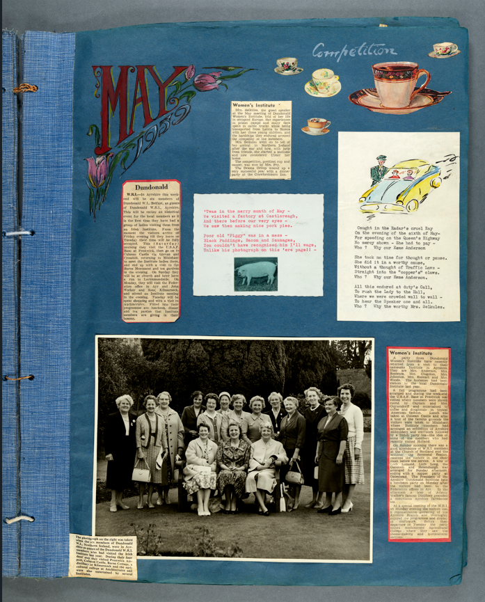Open page of a scrapbook containing colourful text, newspaper clippings and a black and white group photo of 16 women at the bottom. The pages of the scrapbook are blue.